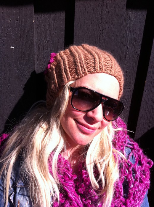Ullis in brown deelicious beanie with matching cerice flower and deelicious scarf!